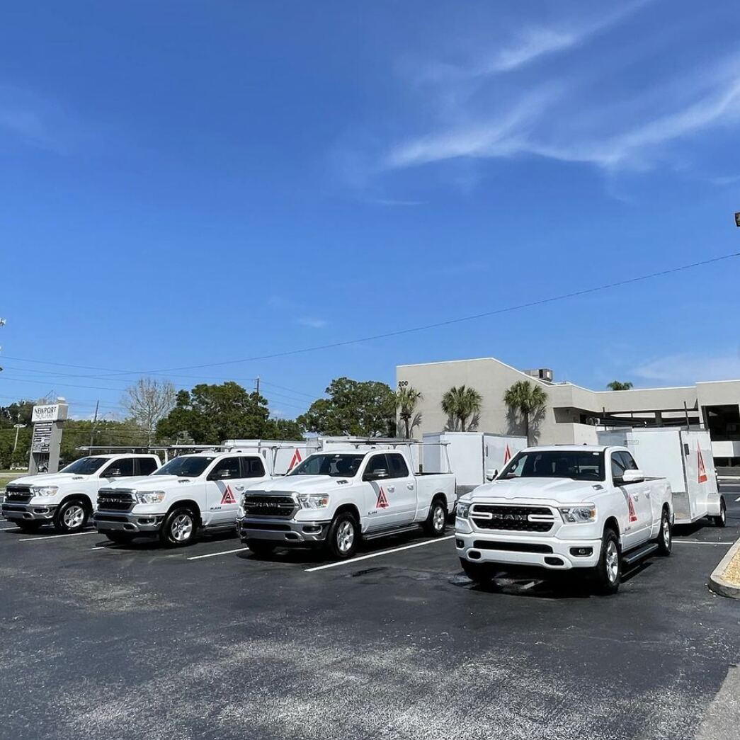 Affordable Solar Roof & Air service trucks